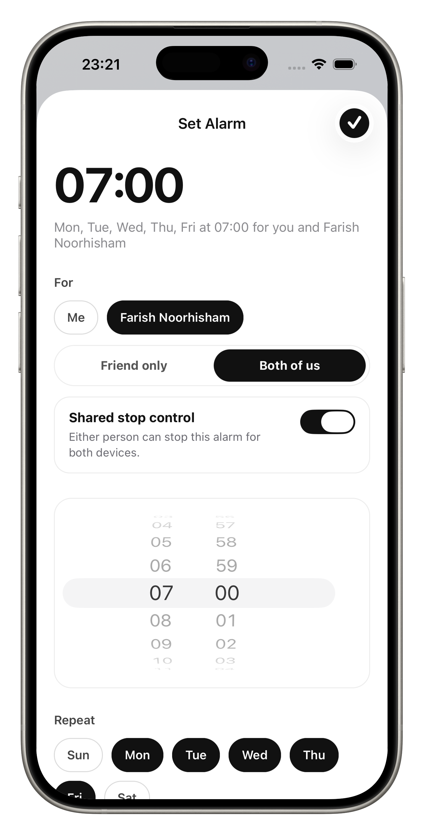 Alarmee set alarm screen with time picker and friend selector